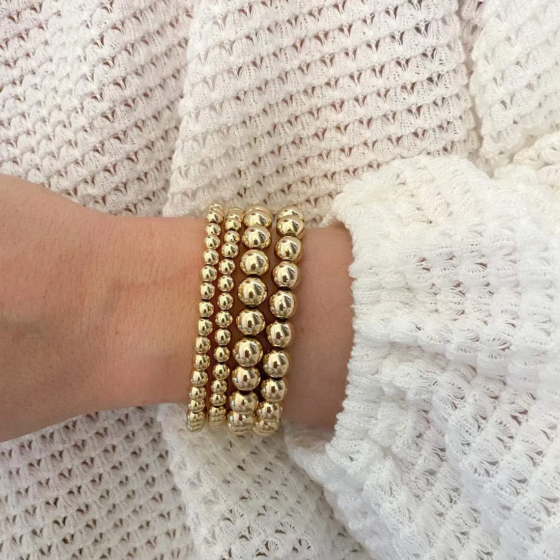 Reoxvo Gold Beaded Bracelets for Women Non Tarnish Stack 14K Gold Plated Stretch Elastic Bead Ball Bracelet Jewelry Set for Women Trendy